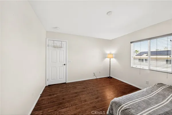a view of a livingroom with wooden floor
