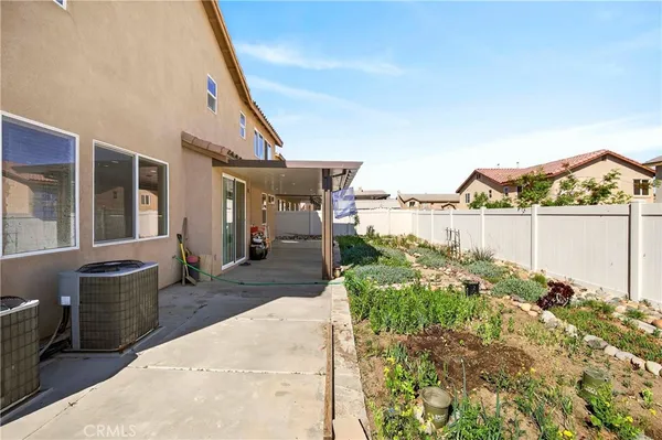 a house view with a outdoor space