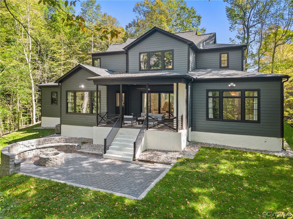 8576 Barrique Road New Kent, VA 23124 - Photo 2 of 50 a front view of a house with garden