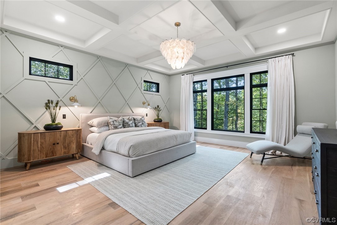 8576 Barrique Road New Kent, VA 23124 - Photo 23 of 50 a spacious bedroom with a bed and a large window