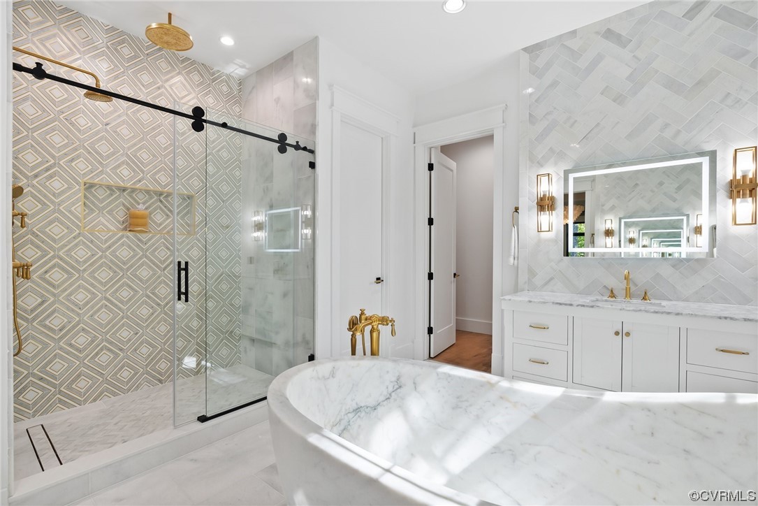8576 Barrique Road New Kent, VA 23124 - Photo 24 of 50 a bathroom with a granite countertop sink mirror bathtub and shower