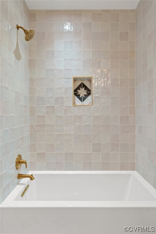 8576 Barrique Road New Kent, VA 23124 - Photo 34 of 50 a bathroom with a bathtub and a shower