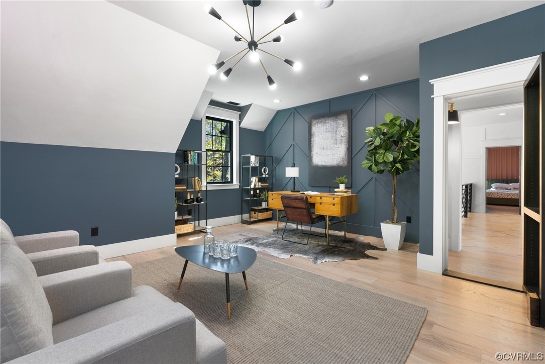 8576 Barrique Road New Kent, VA 23124 - Photo 40 of 50 a living room with furniture and a chandelier