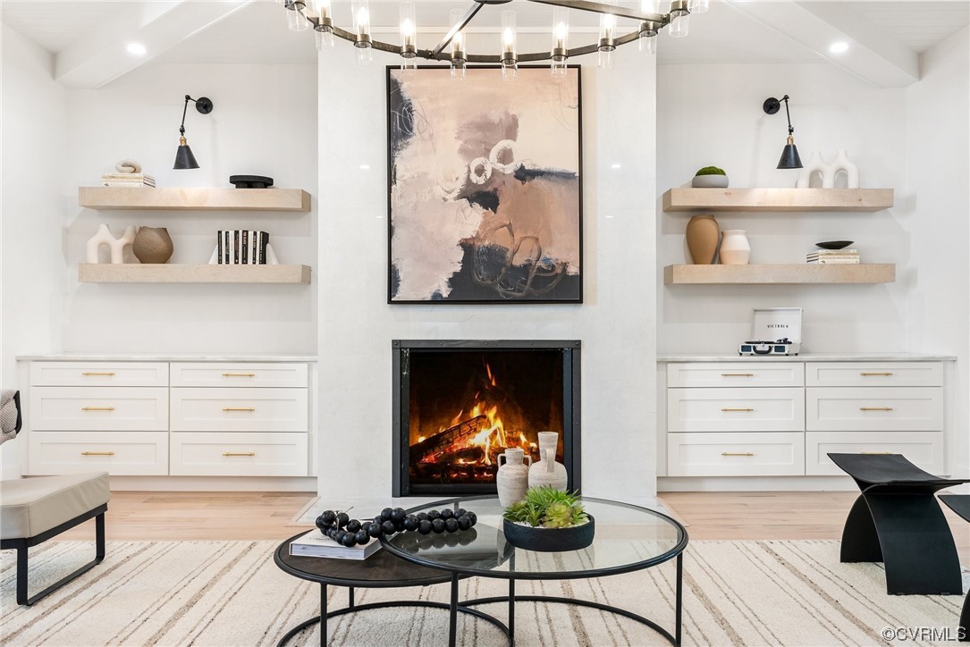 8576 Barrique Road New Kent, VA 23124 - Photo 4 of 50 a living room with cabinets and a fireplace