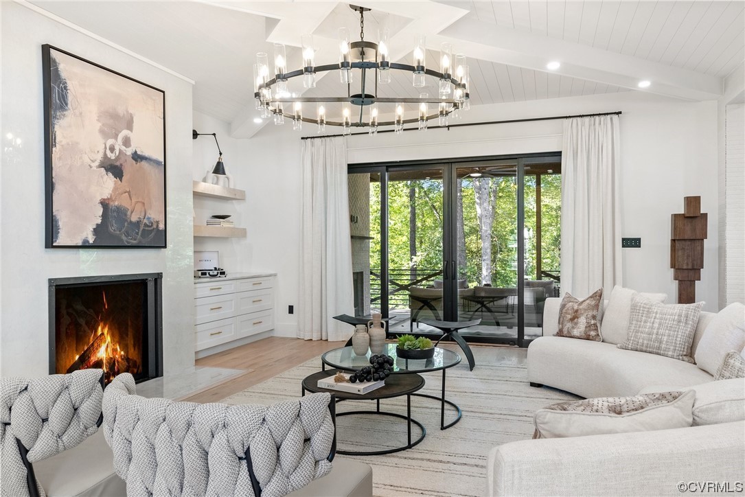 8576 Barrique Road New Kent, VA 23124 - Photo 5 of 50 a living room with furniture and a fireplace
