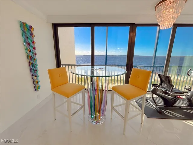 a patio with a table and chairs