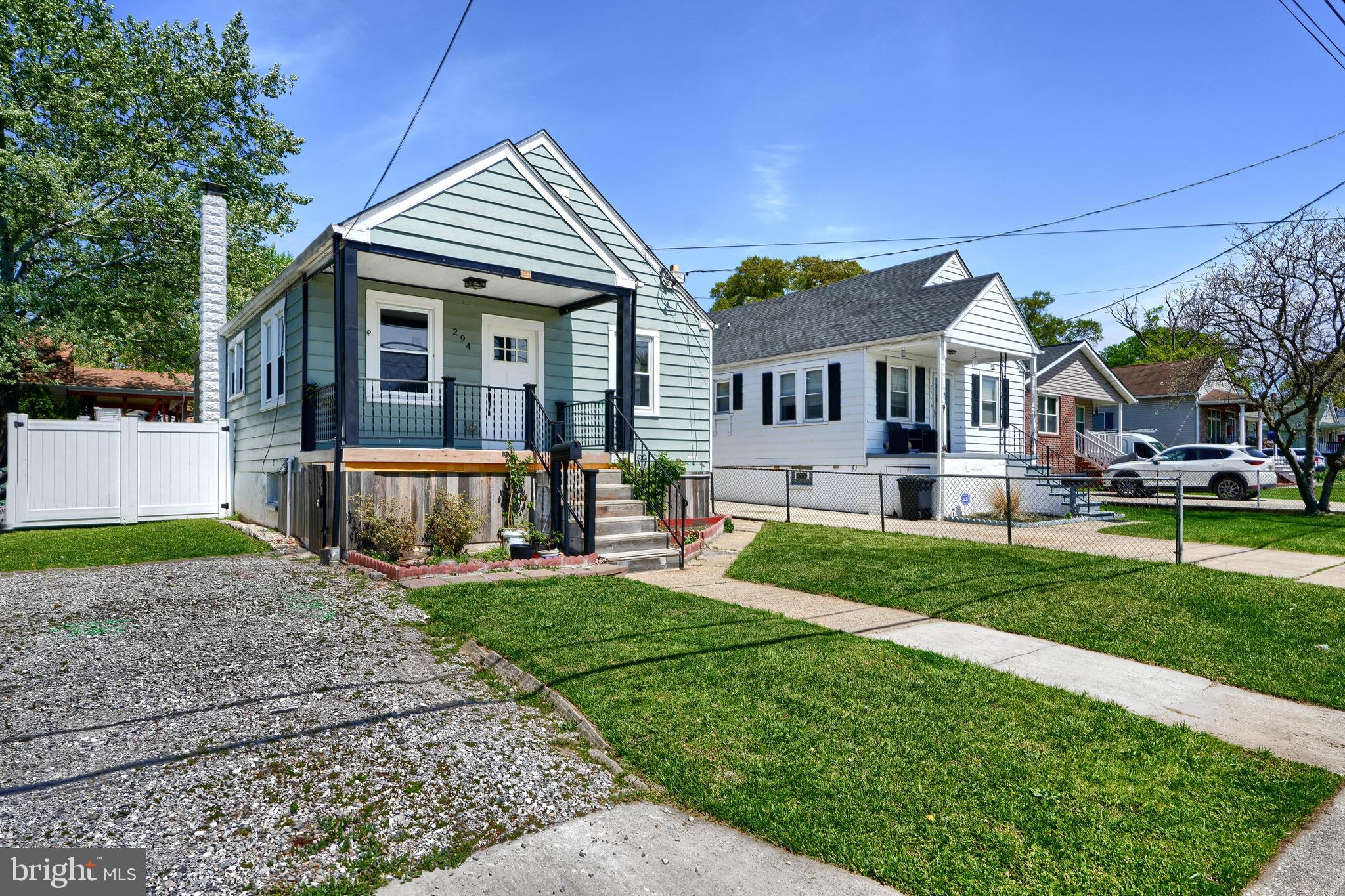 294 Stillwater Road Baltimore, MD 21221 - Photo 2 of 40 a front view of a house with a yard