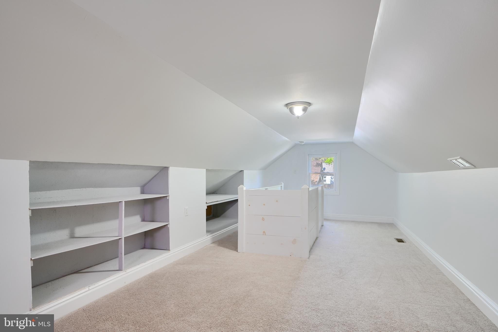 294 Stillwater Road Baltimore, MD 21221 - Photo 28 of 40 a view of a room with shelves