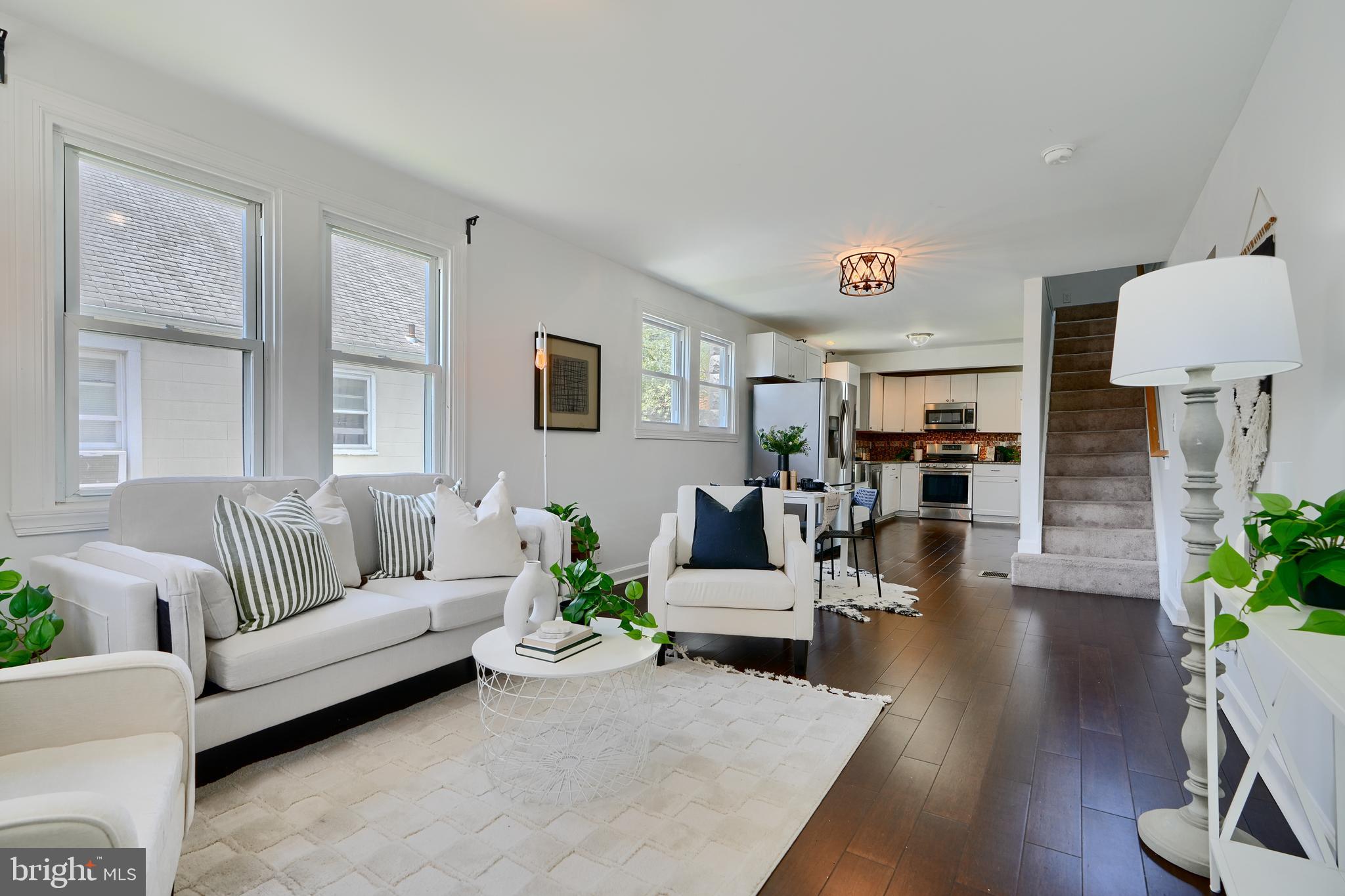 294 Stillwater Road Baltimore, MD 21221 - Photo 5 of 40 a living room with furniture and a table