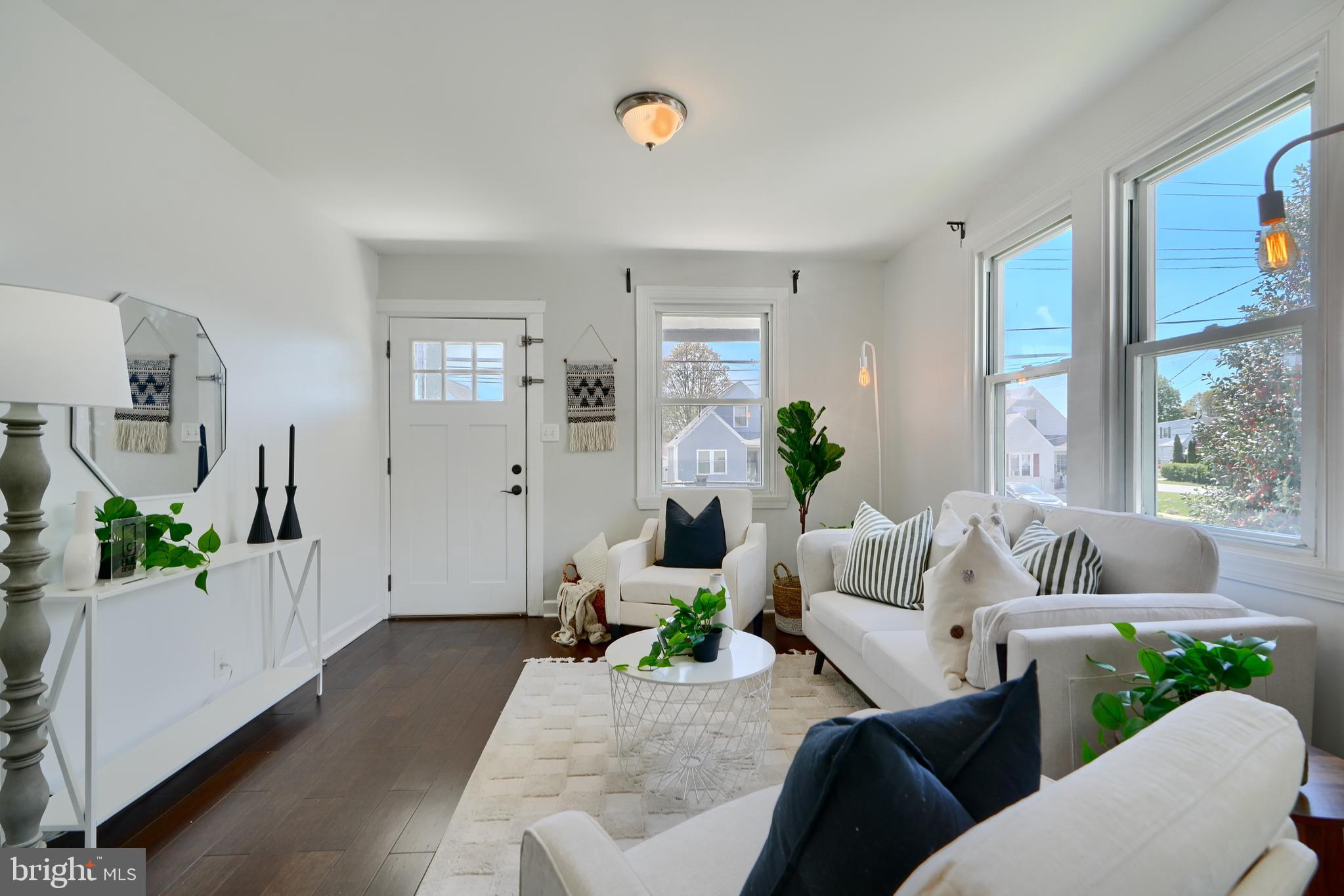 294 Stillwater Road Baltimore, MD 21221 - Photo 8 of 40 a living room with furniture and wooden floor