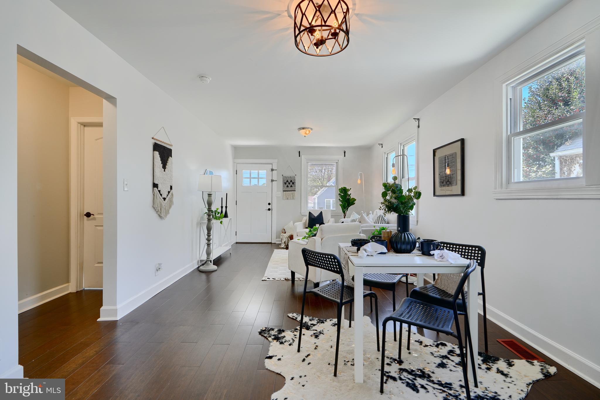 294 Stillwater Road Baltimore, MD 21221 - Photo 9 of 40 a view of a dining room with furniture window and wooden floor