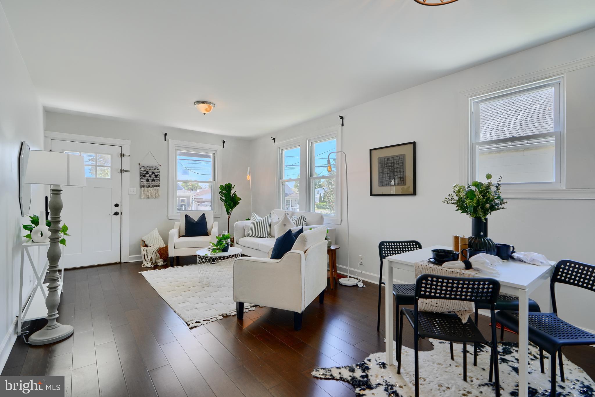 294 Stillwater Road Baltimore, MD 21221 - Photo 10 of 40 a living room with furniture and wooden floor
