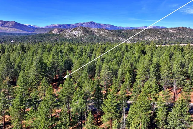 a view of a city with a mountain