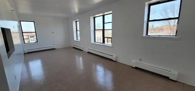 an empty room with windows