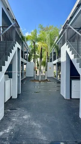 a view of a house with a park