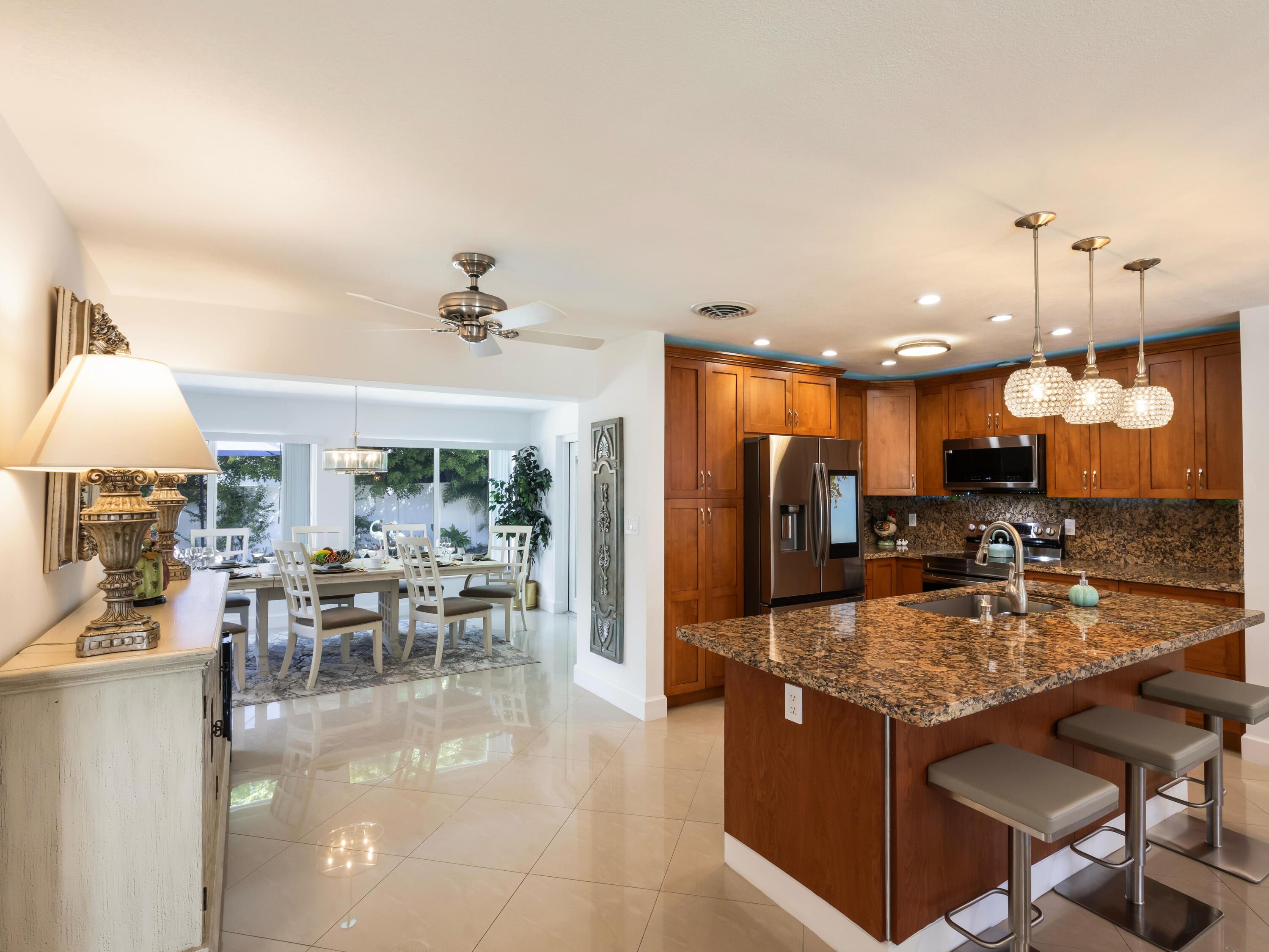 301 Northeast 23rd Street Boca Raton, FL 33431 - Photo 12 of 43 a view of a dining room with furniture