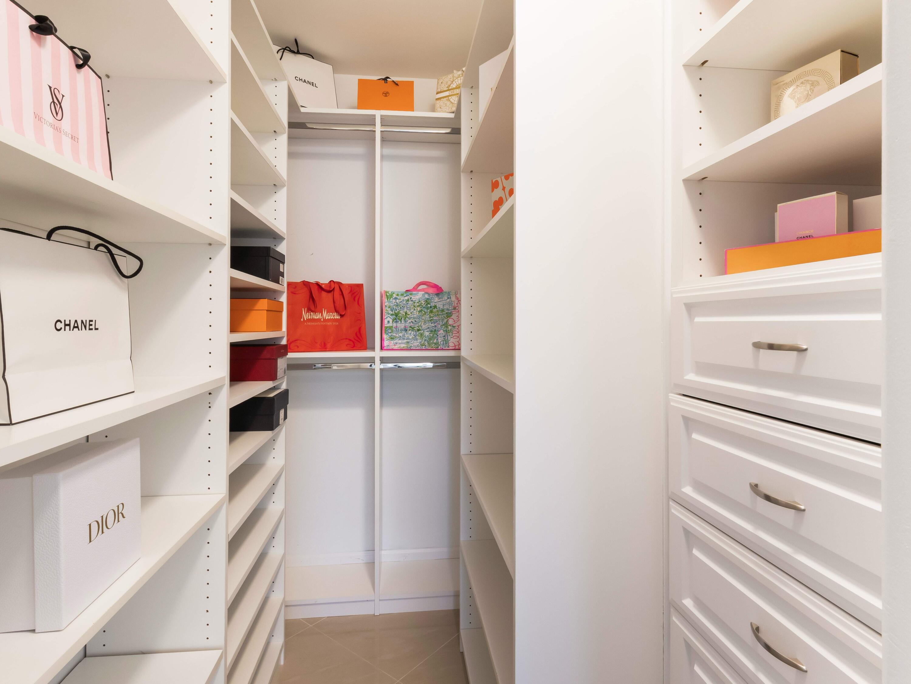 301 Northeast 23rd Street Boca Raton, FL 33431 - Photo 21 of 43 a view of walk in closet and bathroom