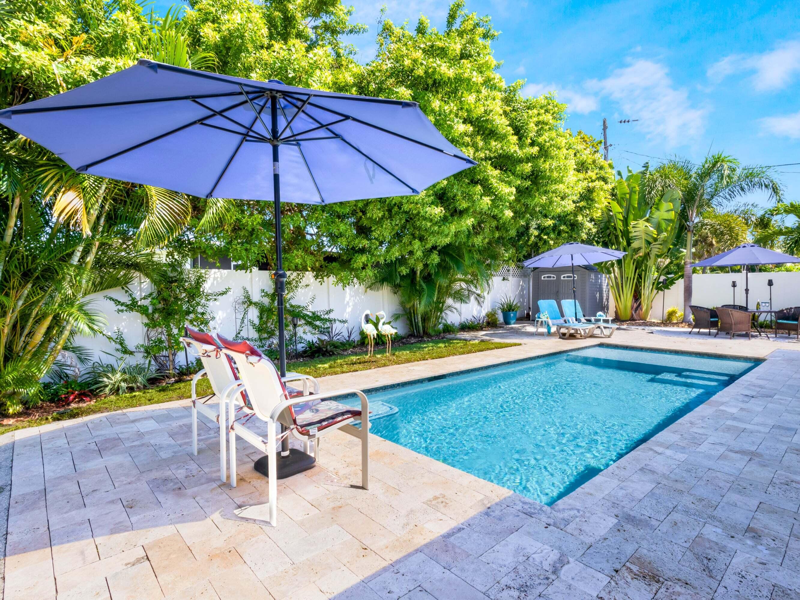 301 Northeast 23rd Street Boca Raton, FL 33431 - Photo 34 of 43 a view of a swimming pool with a patio