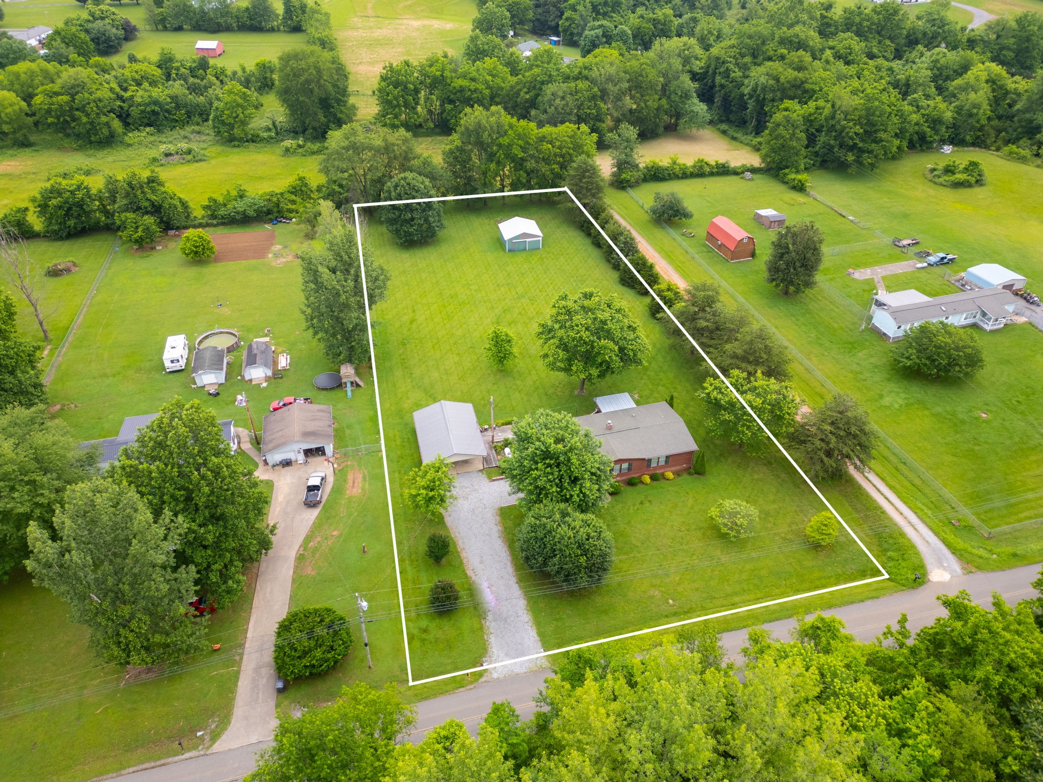 4420 William Woodard Road Springfield, TN 37172 - Photo 1 of 31 an aerial view of tennis court