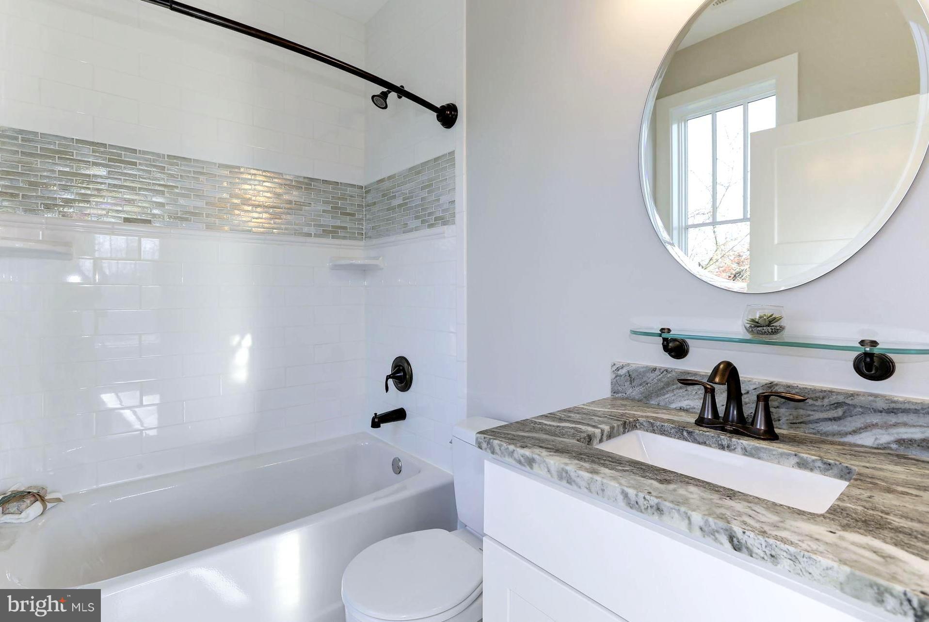 661 Red Cedar Road Annapolis, MD 21409 - Photo 32 of 47 En Suite Inlaid Tile Bath
