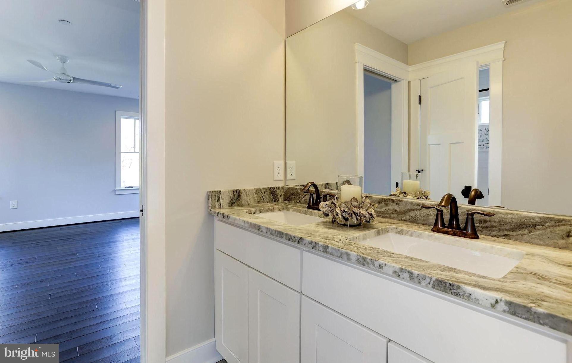 661 Red Cedar Road Annapolis, MD 21409 - Photo 34 of 47 En Suite Bath Hosting Granite Vanity
