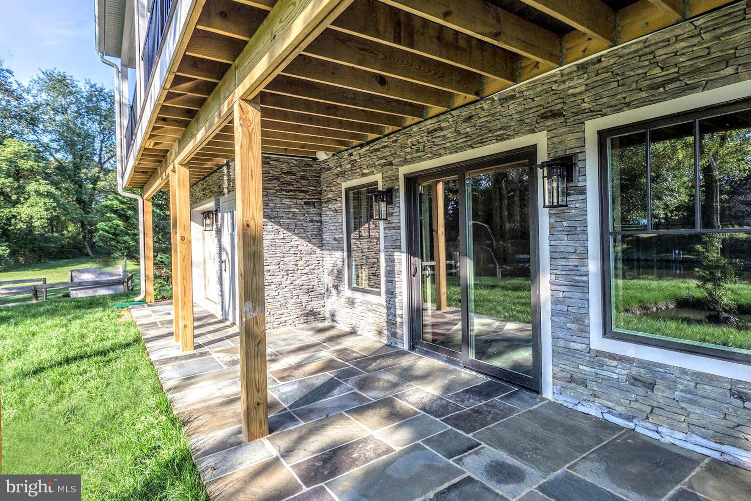 661 Red Cedar Road Annapolis, MD 21409 - Photo 42 of 47 Covered Stone Grilling and Lounging Patio