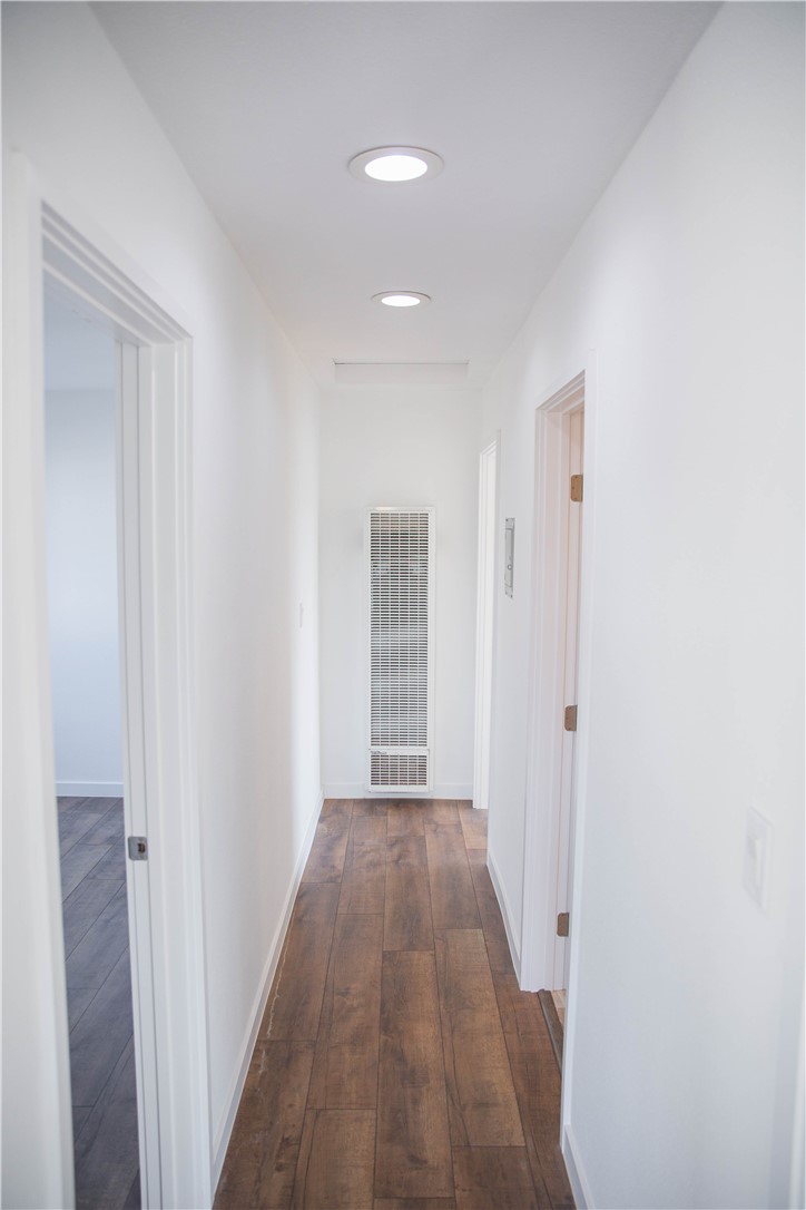 5908 Atlantic Avenue, Unit D Long Beach, CA 90805 - Photo 15 of 36 a view of a hallway with wooden floor