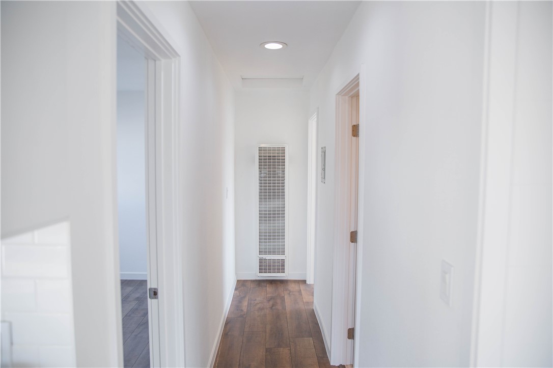5908 Atlantic Avenue, Unit D Long Beach, CA 90805 - Photo 16 of 36 a view of a hallway with wooden floor