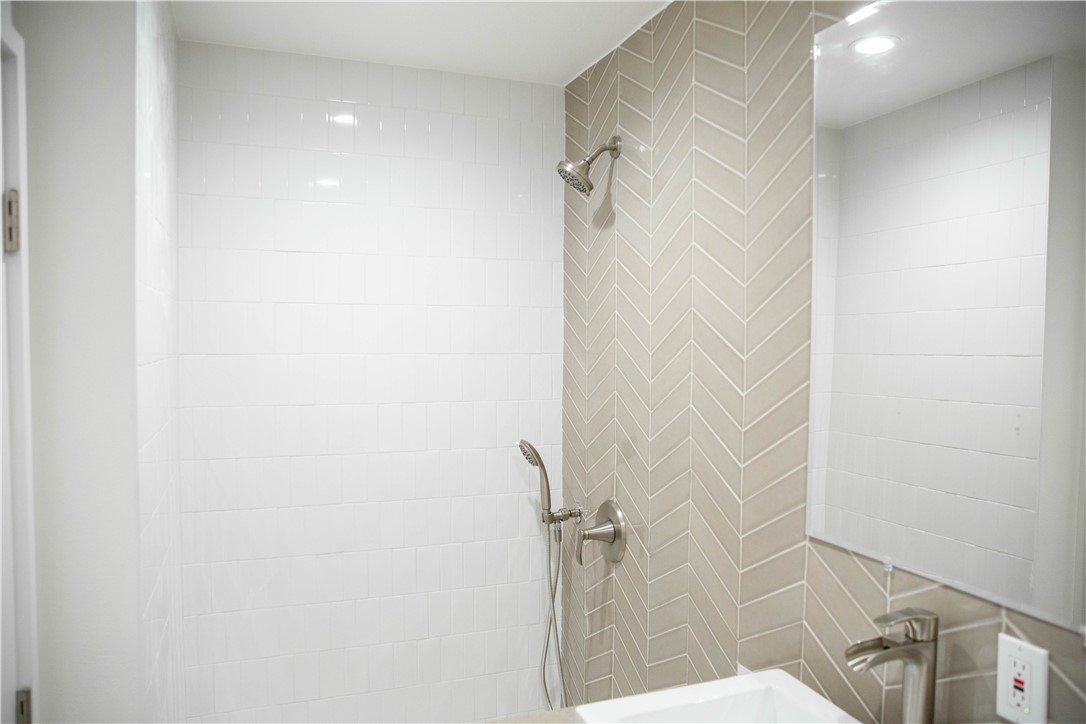 5908 Atlantic Avenue, Unit D Long Beach, CA 90805 - Photo 21 of 36 a bathroom with a shower