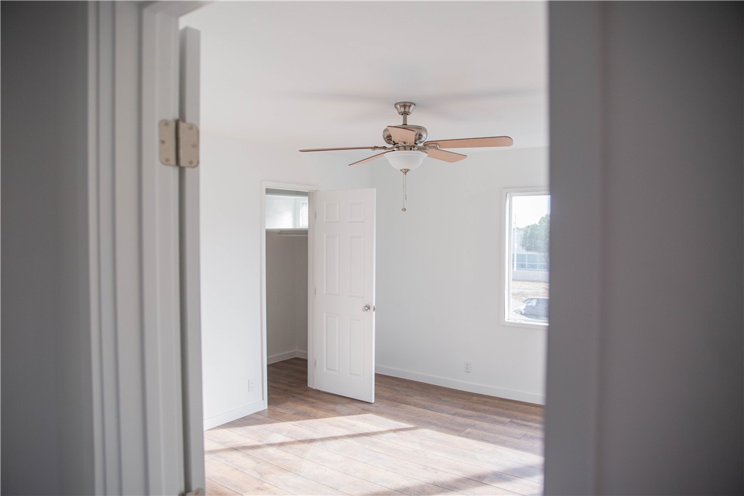 5908 Atlantic Avenue, Unit D Long Beach, CA 90805 - Photo 24 of 36 an empty room that has a window in it