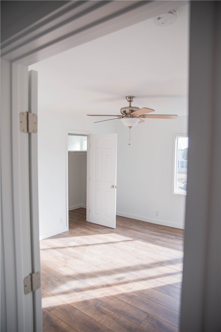 5908 Atlantic Avenue, Unit D Long Beach, CA 90805 - Photo 25 of 36 a view of a room with rack on the wall