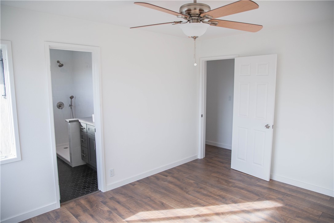 5908 Atlantic Avenue, Unit D Long Beach, CA 90805 - Photo 27 of 36 a view of an entryway with wooden floor