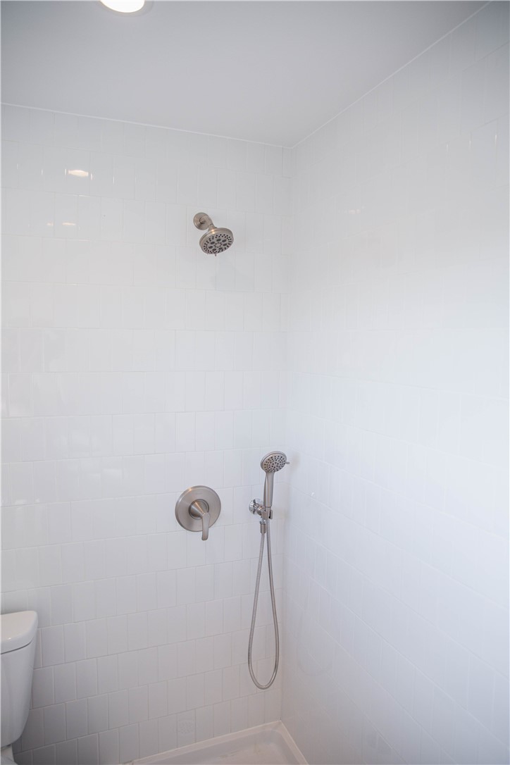 5908 Atlantic Avenue, Unit D Long Beach, CA 90805 - Photo 32 of 36 a bathroom with a shower