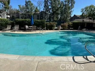 a view of a backyard with sitting area