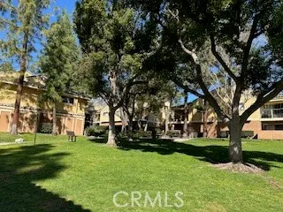 a view of a backyard with sitting area