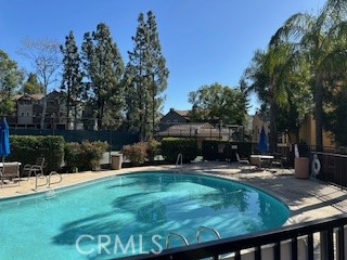 10655 Lemon Avenue, Unit 3401 Rancho Cucamonga, CA 91737 - Photo 17 of 27 a view of a backyard with sitting area