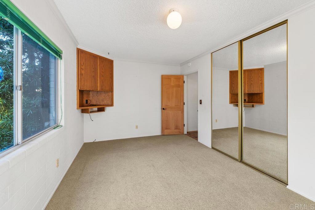 16522 Orchard Bend Road Poway, CA 92064 - Photo 17 of 26 a view of an empty room with a window