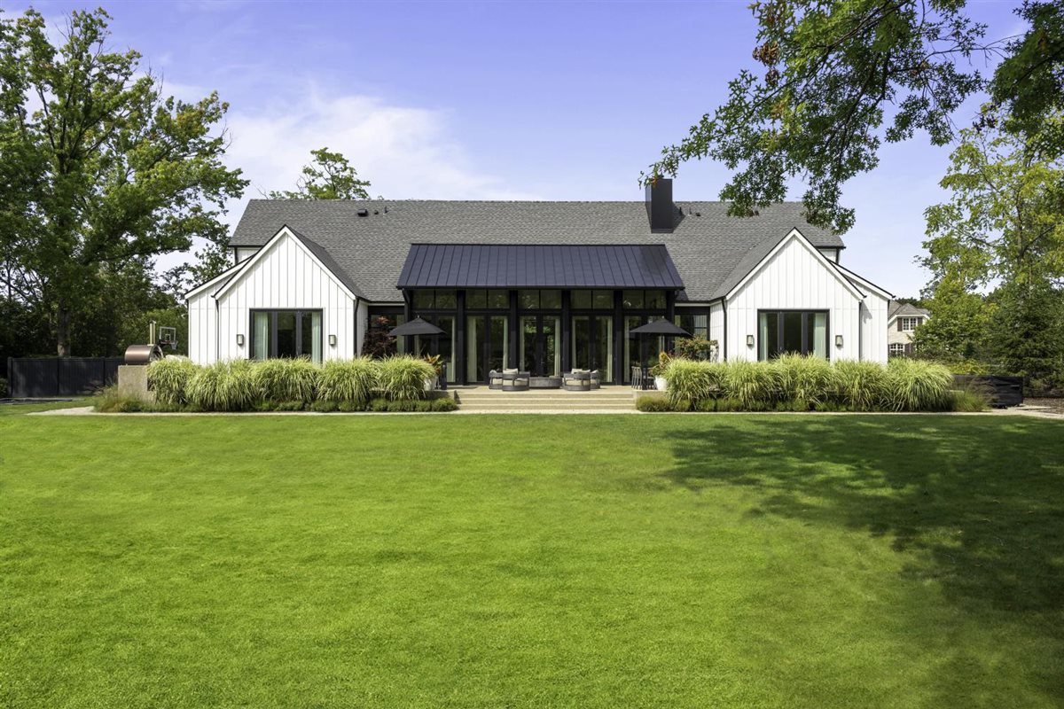 2064 Norfork Road Northfield, IL 60093 - Photo 61 of 63 a front view of a house with a garden