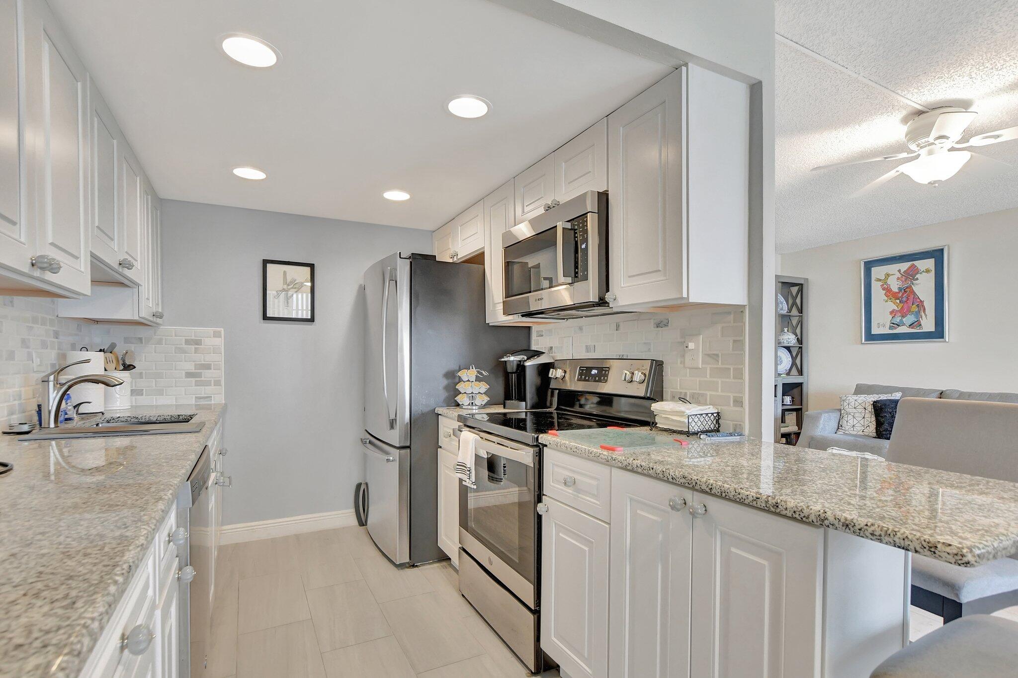 1081 Exeter Boca Raton, FL 33434 - Photo 1 of 65 10-web-or-mls-DSC_1361