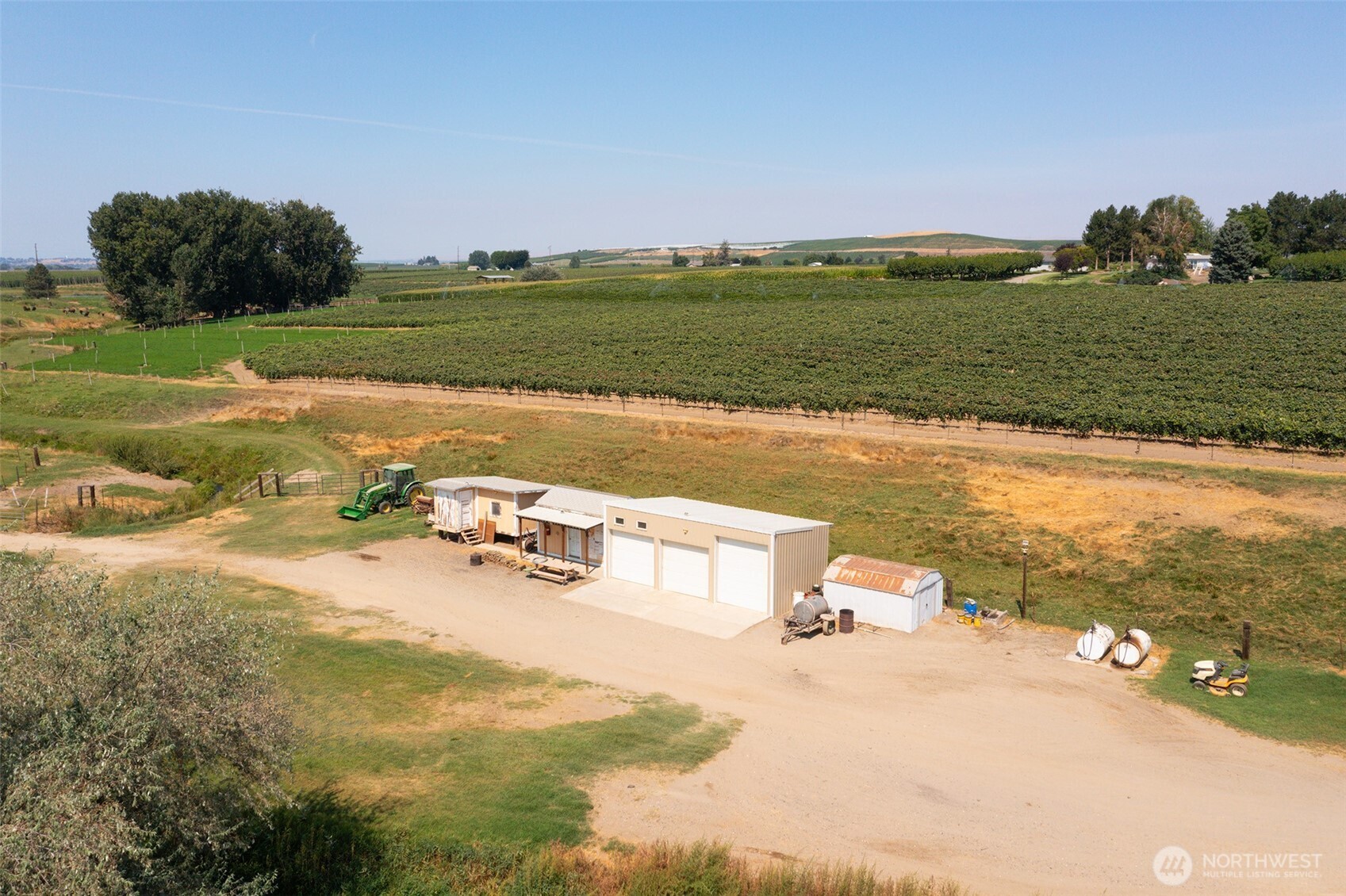 0 Olmstead Road Grandview, WA 98930 - Photo 18 of 31 a view of a lake with a beach
