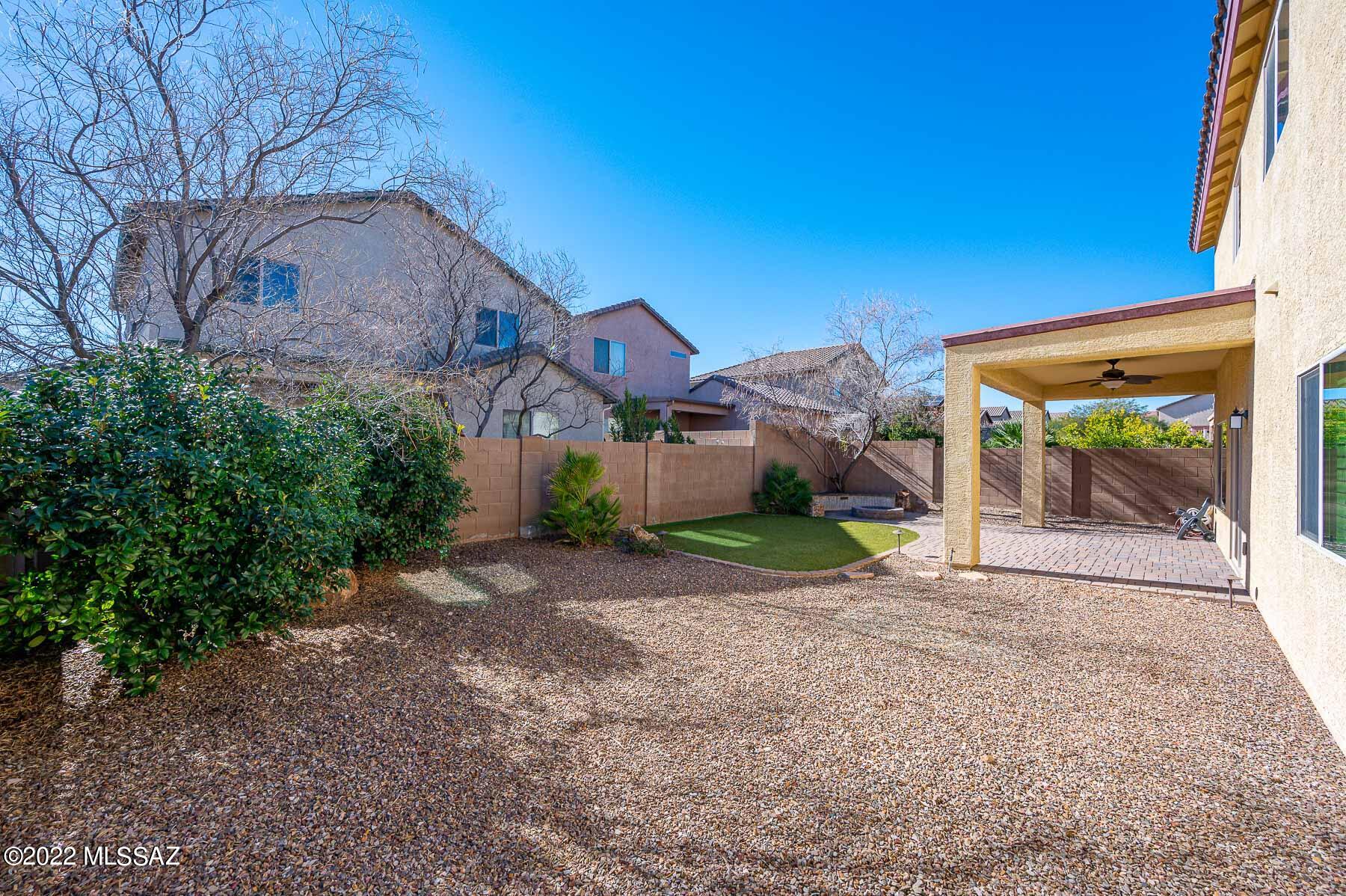 10804 East Salsabila Road Tucson, AZ 85747 - Photo 41 of 50 a view of a house with a yard