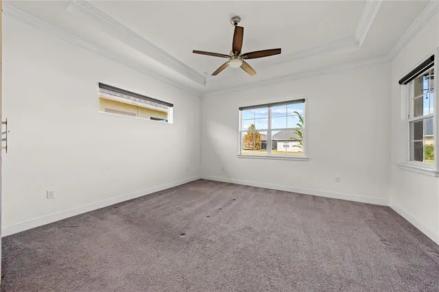 a view of a balcony with wooden floor and lake view