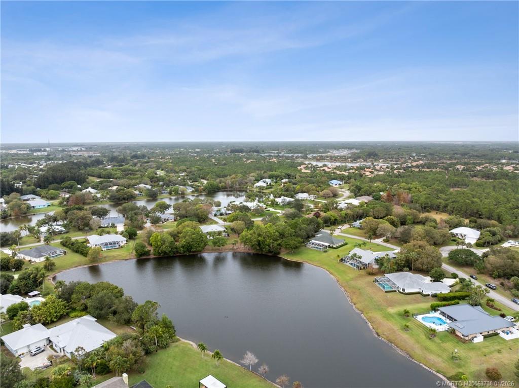 800 Southeast Waterside Way Stuart, FL 34997 - Photo 6 of 27 an aerial view of lake and residential houses with outdoor space
