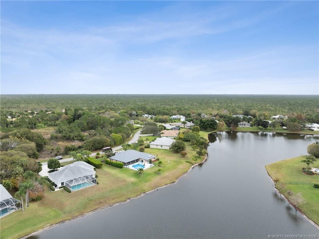 800 Southeast Waterside Way Stuart, FL 34997 - Photo 7 of 27 an aerial view of residential houses with outdoor space and lake view