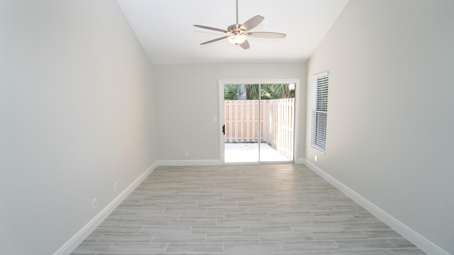 91 Maplecrest Circle Jupiter, FL 33458 - Photo 14 of 27 a view of an empty room with a window