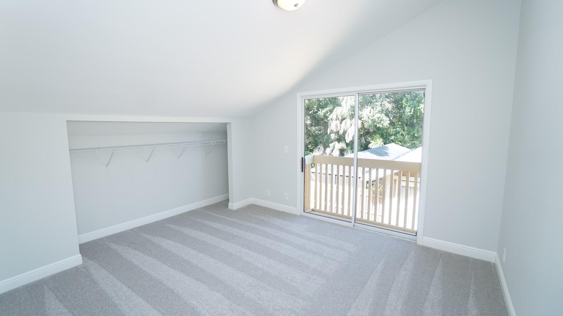 91 Maplecrest Circle Jupiter, FL 33458 - Photo 20 of 27 an empty room with a window