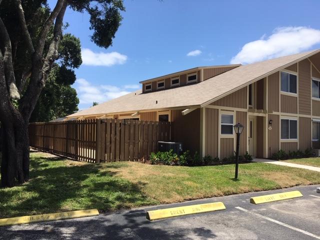 91 Maplecrest Circle Jupiter, FL 33458 - Photo 2 of 27 a view of a house with backyard and garden