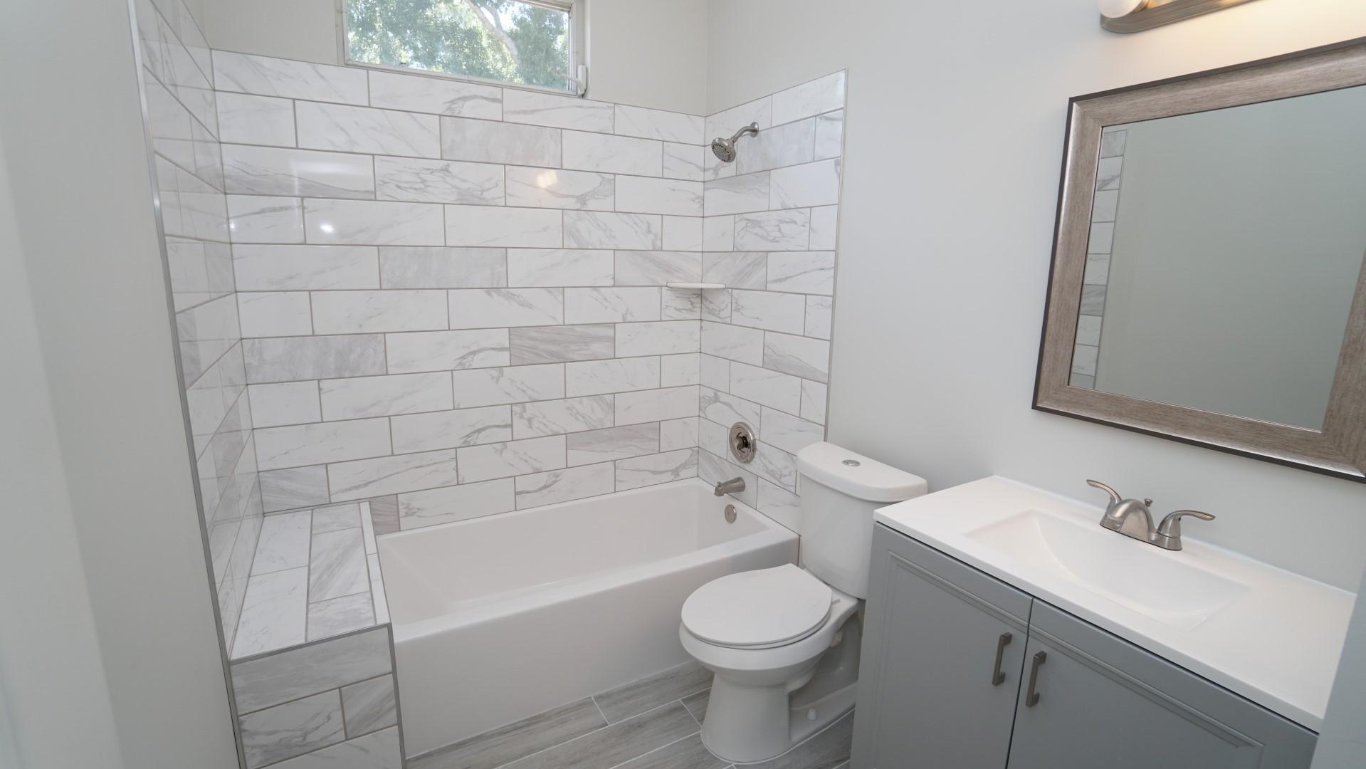 91 Maplecrest Circle Jupiter, FL 33458 - Photo 22 of 27 a bathroom with a sink toilet and shower