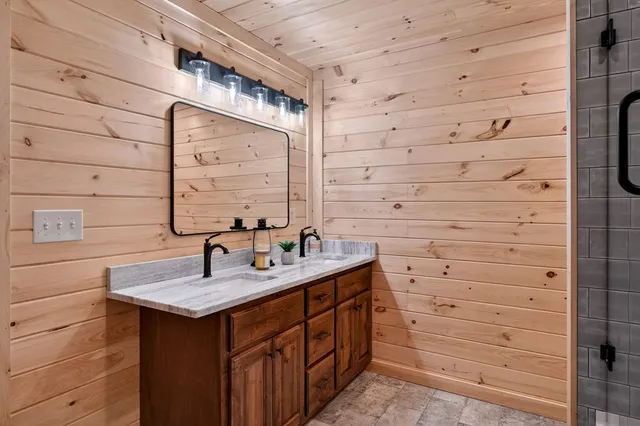 a view of a porch with furniture and garden