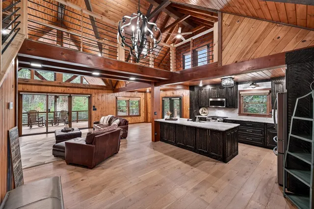 a living room with granite countertop furniture and fireplace